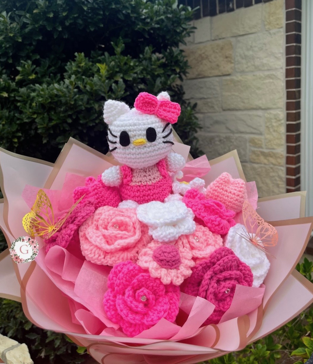 Pink Hello Kitty crochet bouquet with pink and white flowers