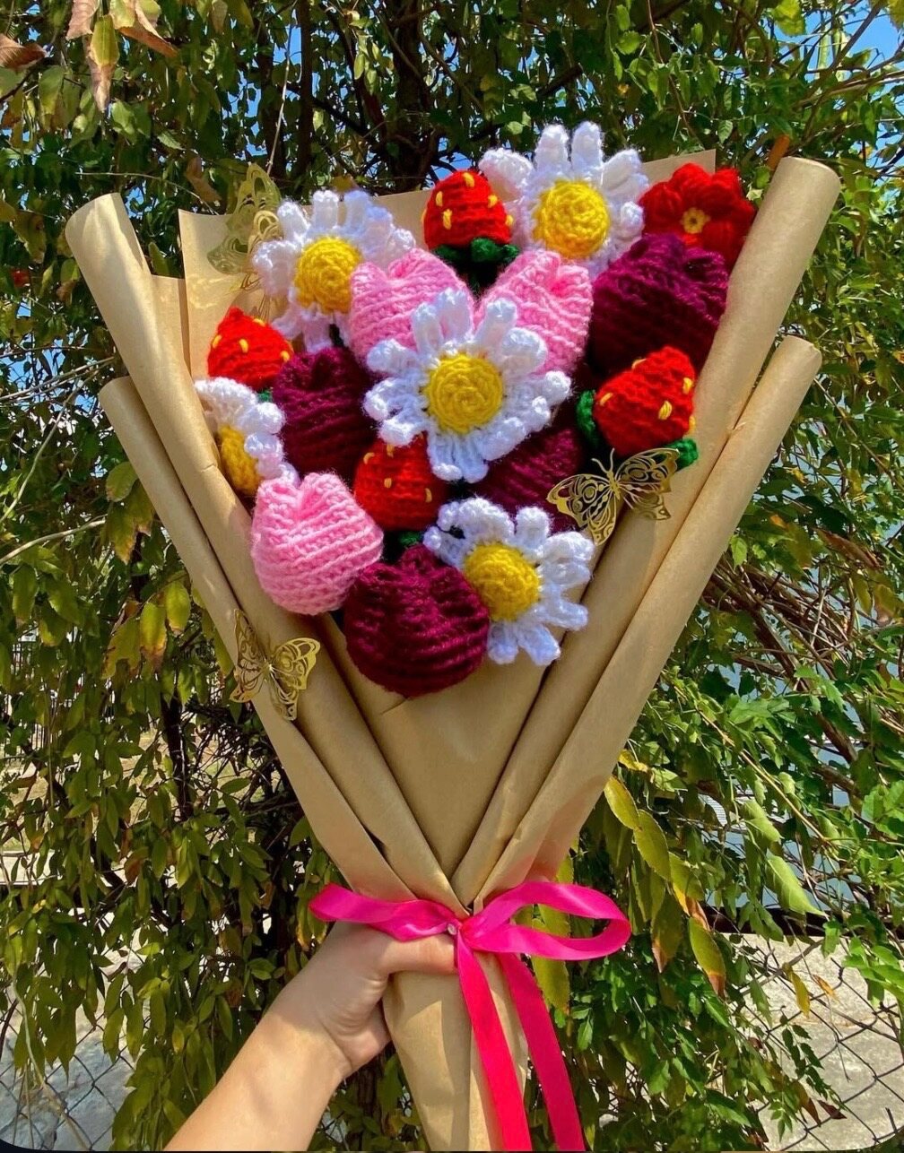 Colorful crochet strawberry, tulip, and daisy bouquet