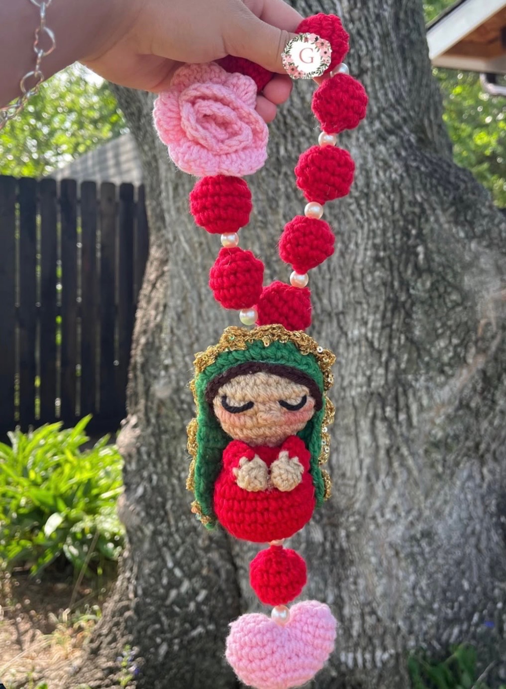 Red and pink floral crochet car mirror hanger