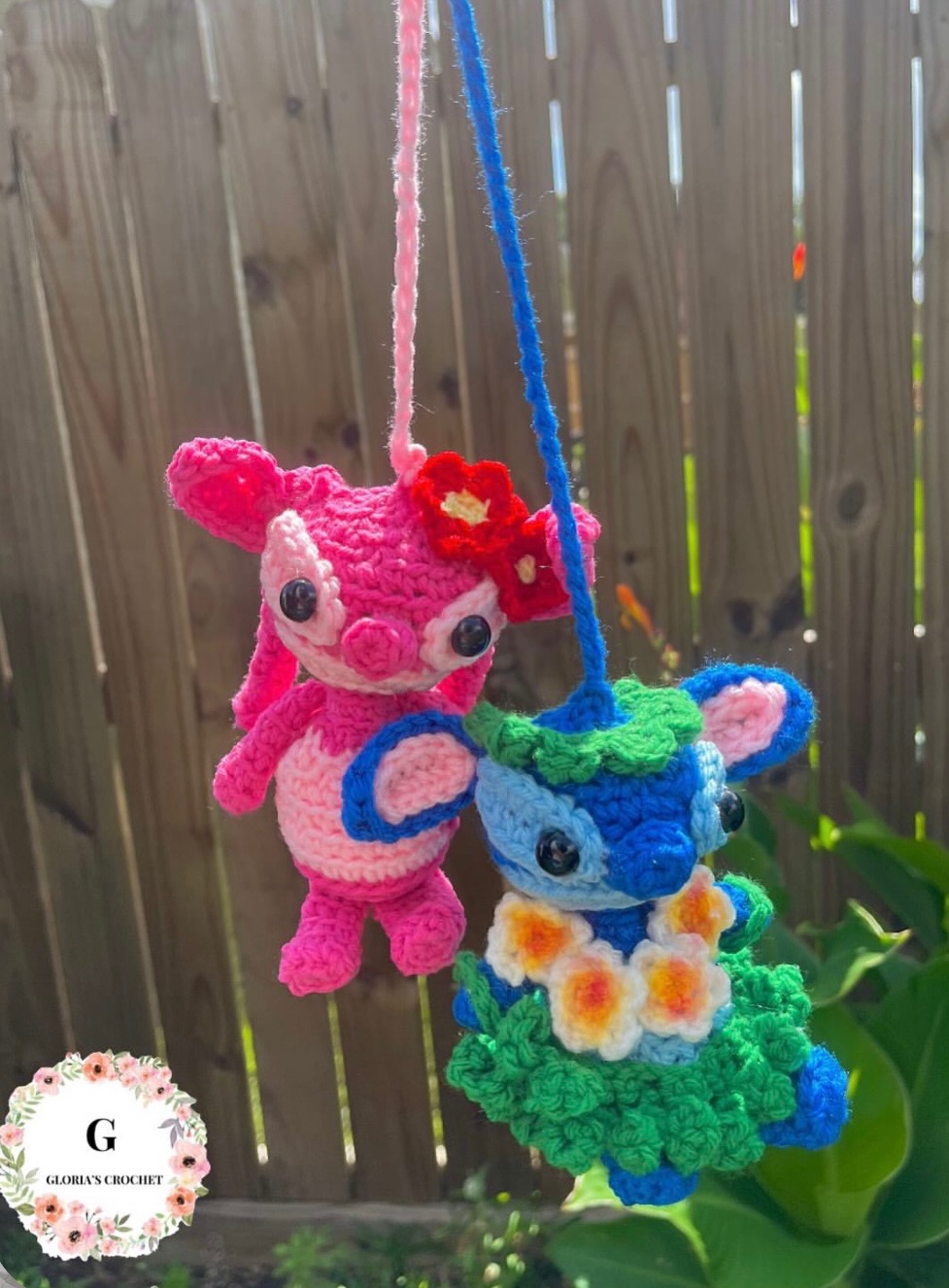 Pink Angel and blue Stitch crochet car mirror hanger pair
