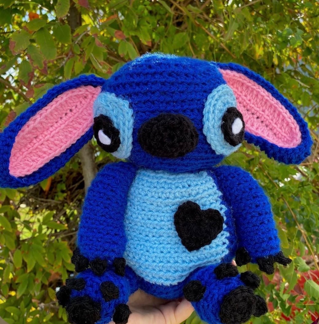 Blue alien crochet character plushie with pink ears