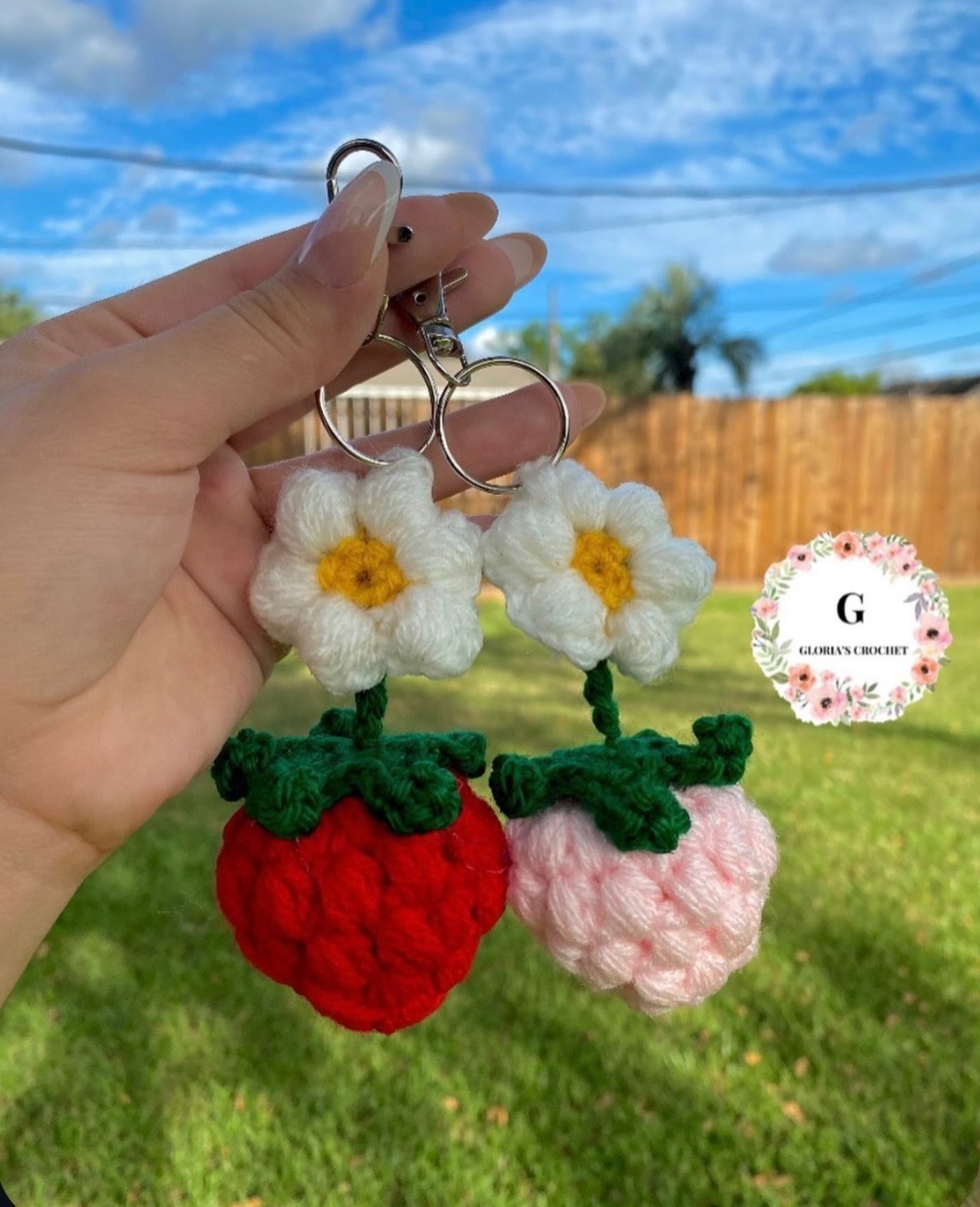 Crochet strawberry and daisy keychain examples