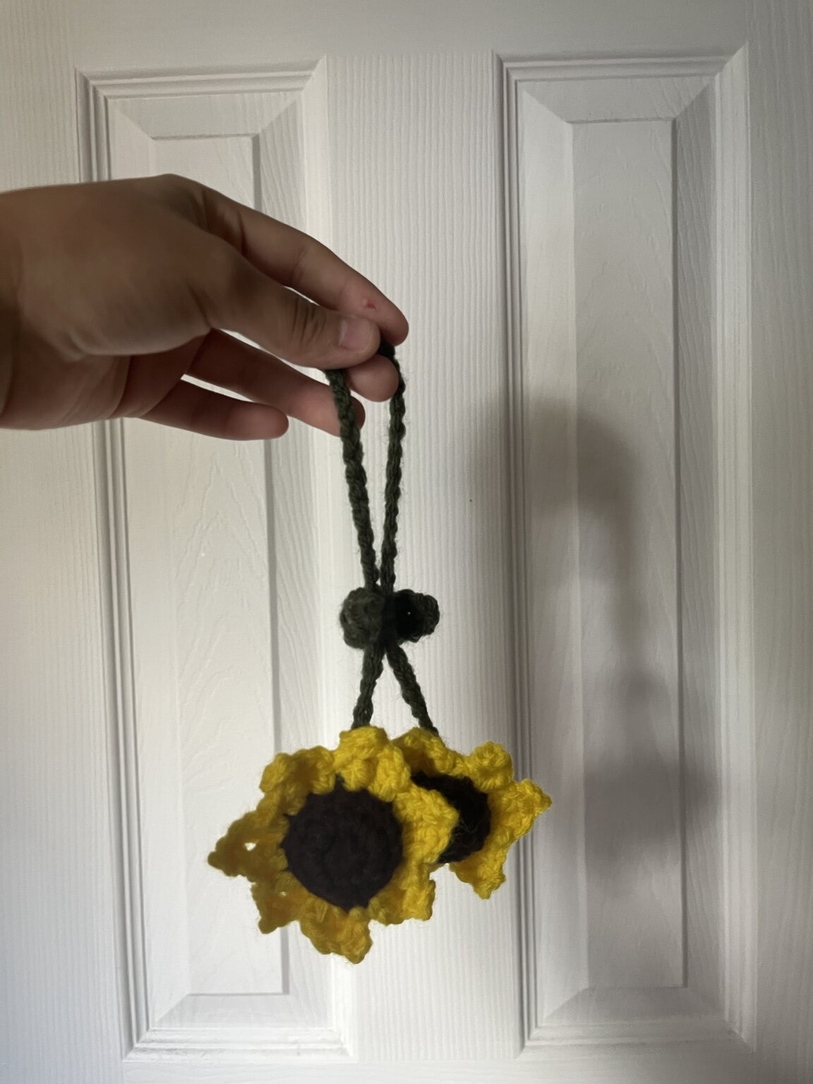 Yellow crochet sunflower car mirror hanger