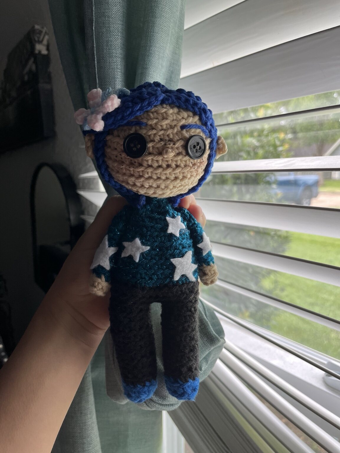 Blue-haired crochet character plushie with stars