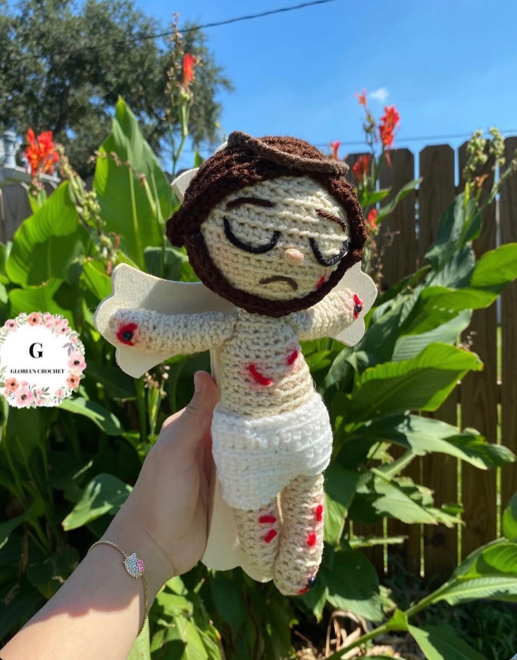 Handmade crochet Jesus plushie in a white garment