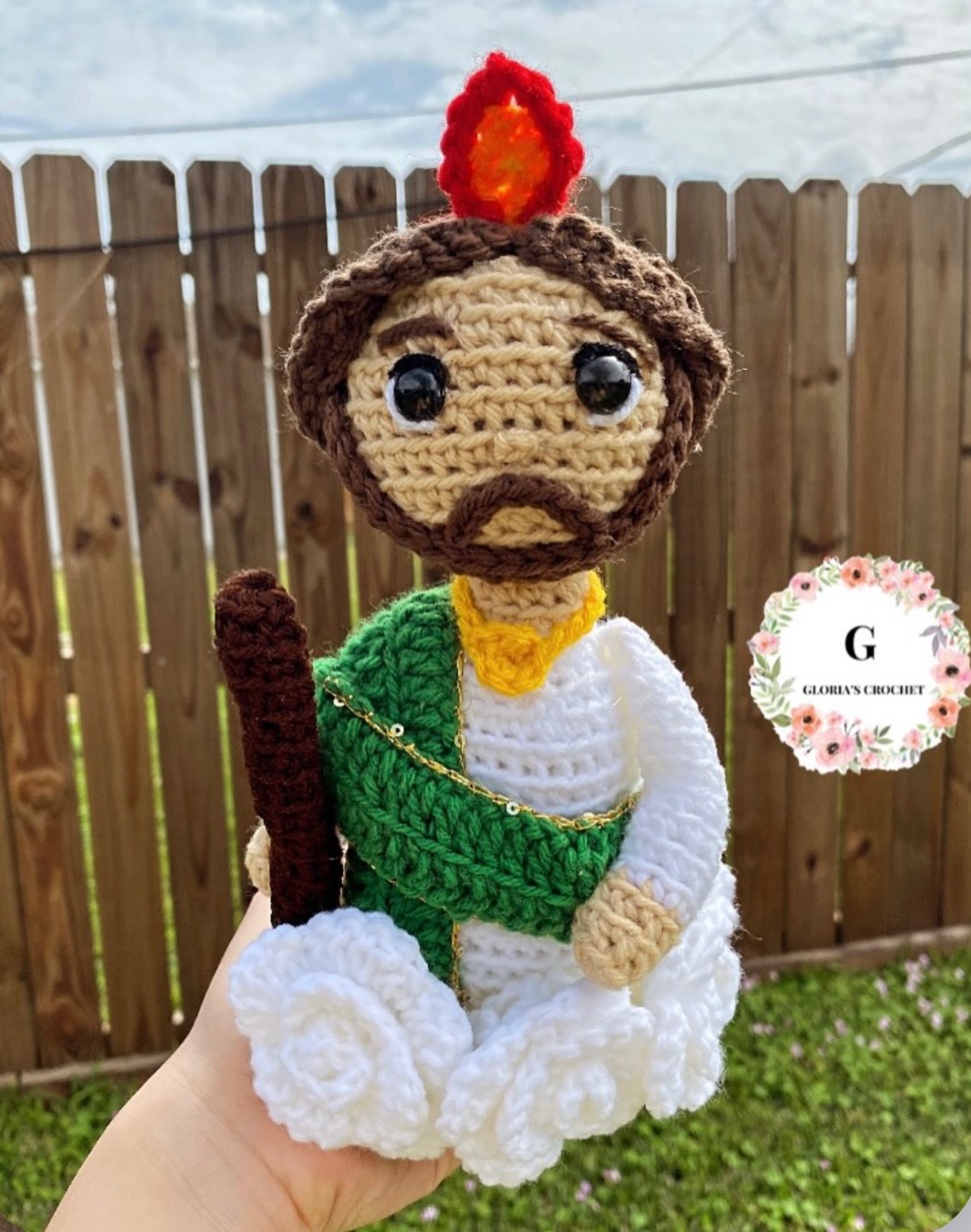 Handmade crochet San Judas plushie with green sash and staff